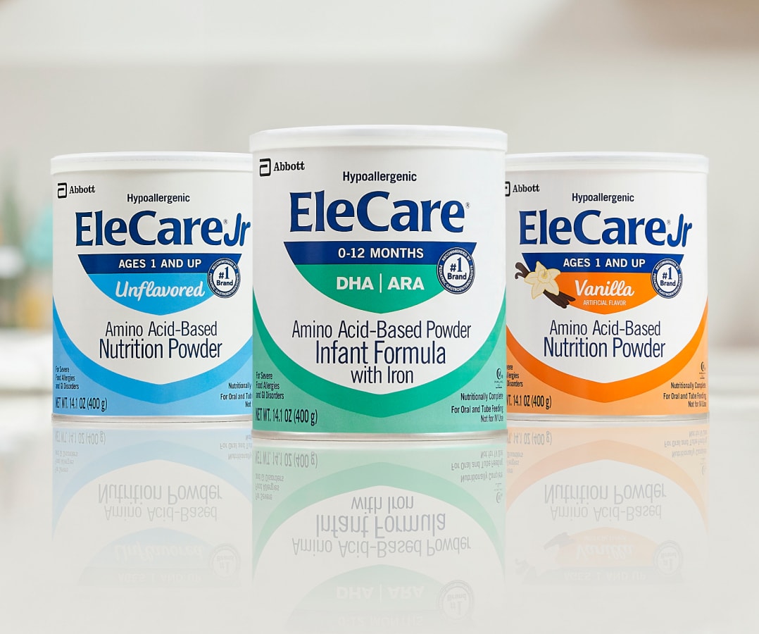 Cans of Unflavored EleCare Jr Nutrition Powder, EleCare Infant Formula, and Vanilla EleCare Jr Nutrition Powder.
